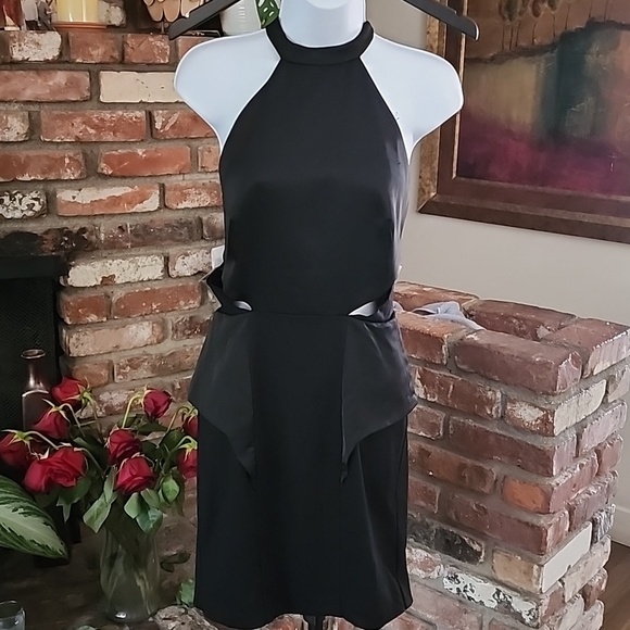 Marciano Dresses & Skirts - Marciano Black Peplum Backless Dress